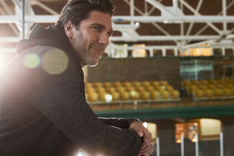NHL Hall-of-Famer Henrik Lundqvist in an arena.