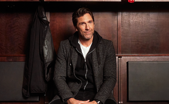 NHL Hall-of-Famer Henrik Lundqvist sitting.